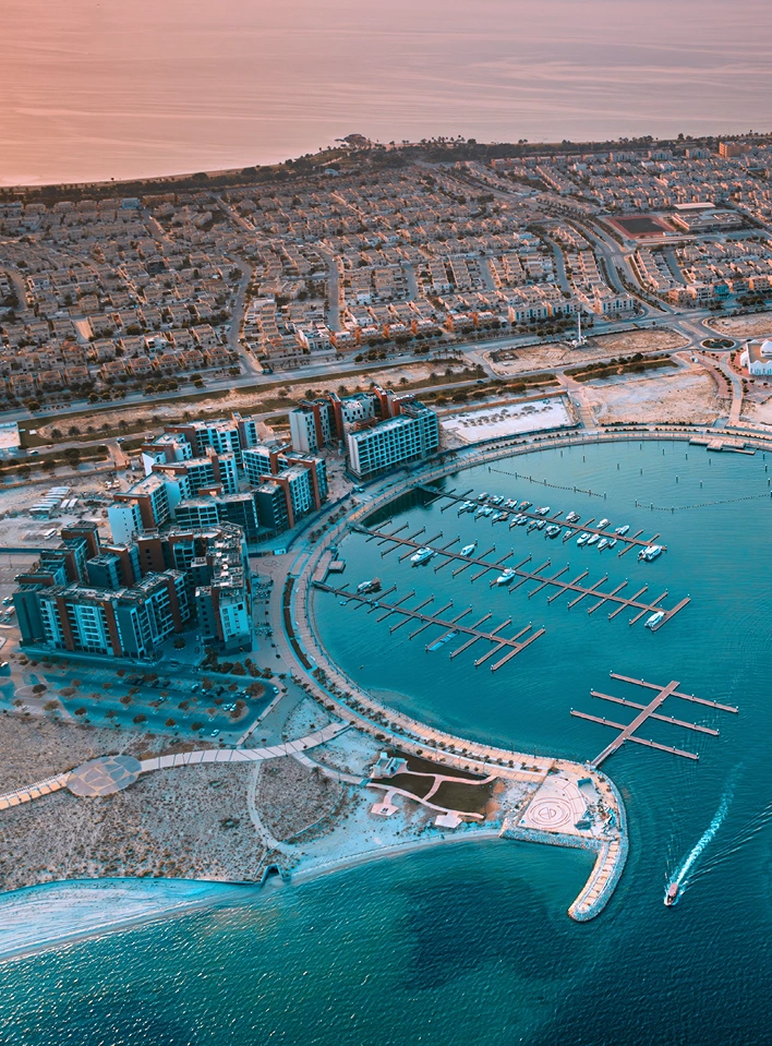 Aerial view of Jubail Bay residences and marina waterfront.