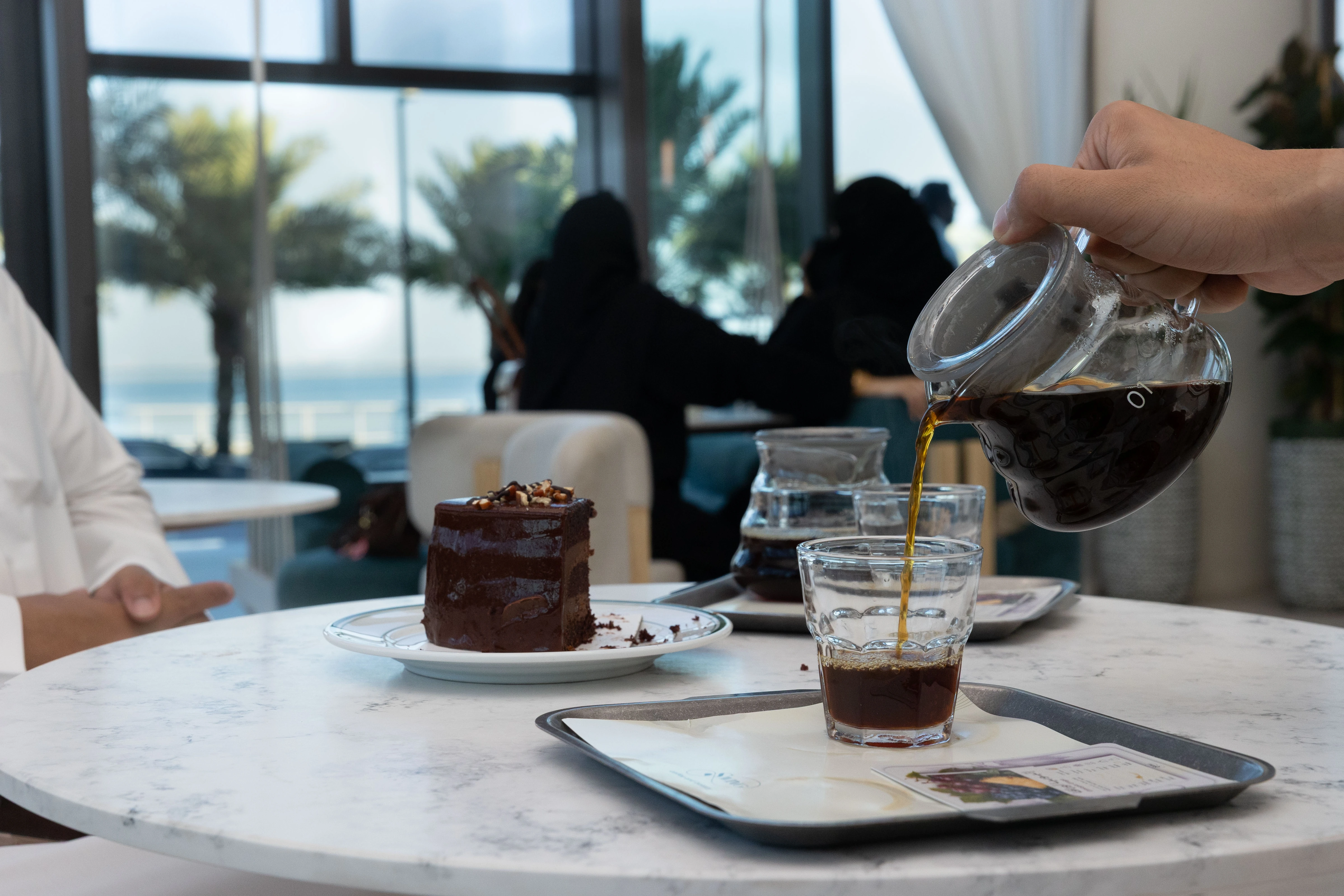 Dining and culinary experiences at Jubail Bay waterfront.